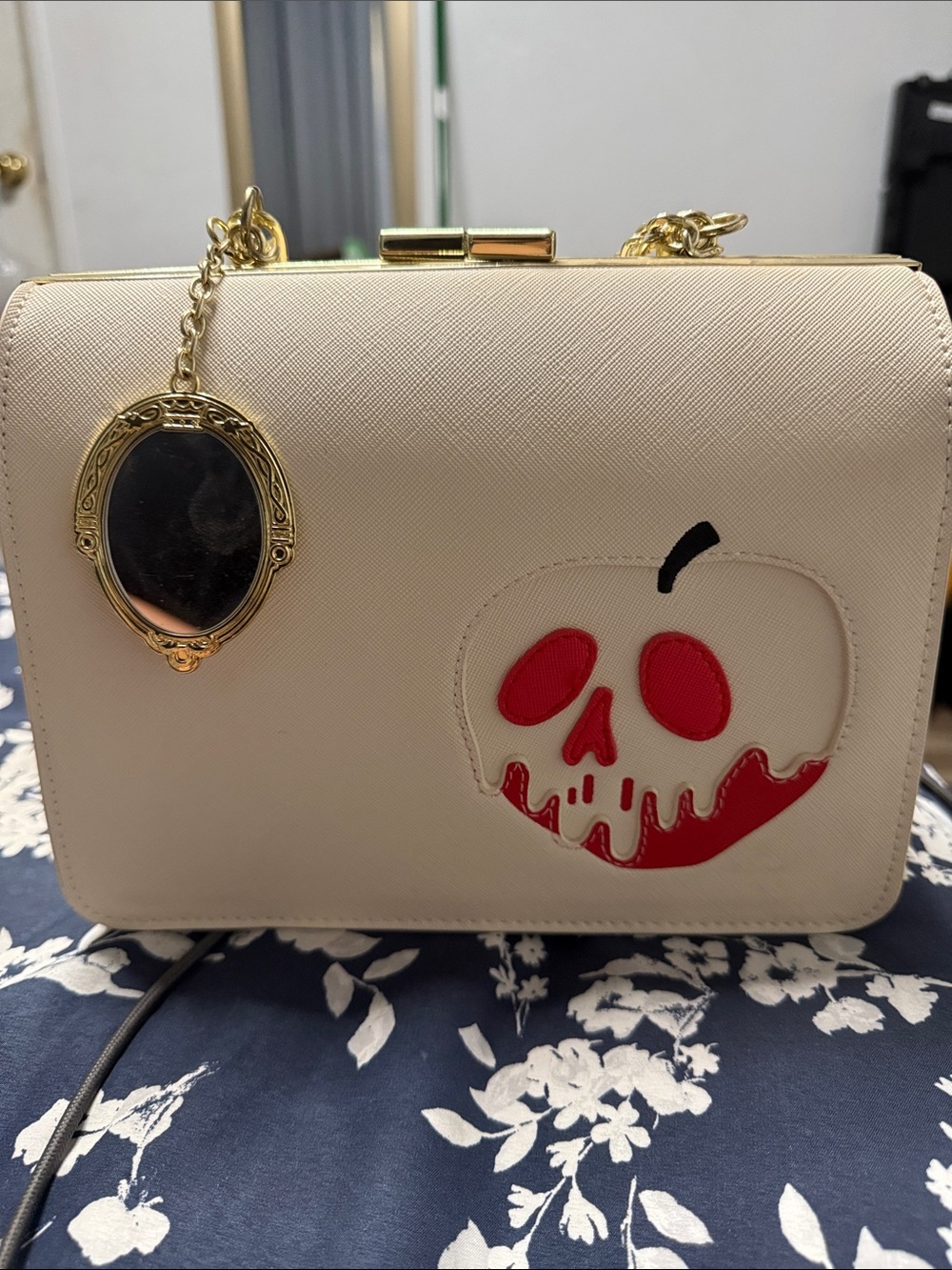 Loungefly Cream Crossbody with Red Skull Apple and Gold Mirror Charm